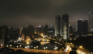 Превью обои небоскреб, здания, дорога, огни, город, ночь