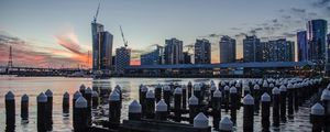 Превью обои небоскреб, здания, город, вода, сумерки