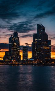 Превью обои небоскребы, ночной город, закат, здания