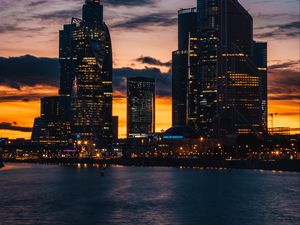 Превью обои небоскребы, ночной город, закат, здания
