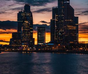 Превью обои небоскребы, ночной город, закат, здания