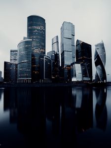 Превью обои небоскребы, здания, архитектура, вода, отражение