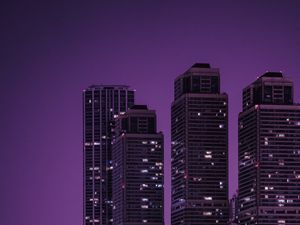 Превью обои небоскребы, здания, город, ночь, темный, фиолетовый