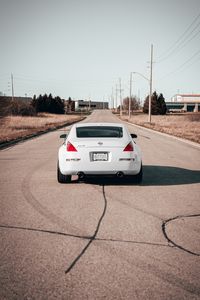 Превью обои nissan 350z, nissan, спорткар, вид сзади, белый