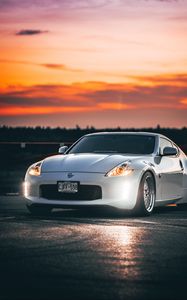 Превью обои nissan 350z, nissan, спорткар, автомобиль, фары, закат