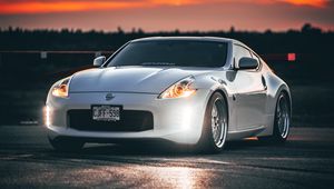 Превью обои nissan 350z, nissan, спорткар, автомобиль, фары, закат