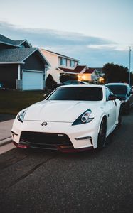 Превью обои nissan 350z, nissan, спорткар, автомобиль, вид спереди, белый