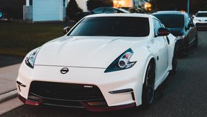 Превью обои nissan 350z, nissan, спорткар, автомобиль, вид спереди, белый