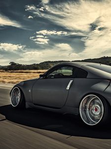 Превью обои nissan, 350z, stance, движение, скорость, вид сбоку