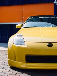 Превью обои nissan 350z, желтый, спорткар, вид спереди, тюнинг