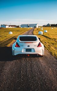 Превью обои nissan 370z, nissan, автомобиль, спорткар, вид сзади, дорога