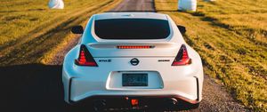 Превью обои nissan 370z, nissan, автомобиль, спорткар, вид сзади, дорога