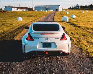 Превью обои nissan 370z, nissan, автомобиль, спорткар, вид сзади, дорога