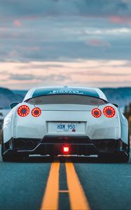 Превью обои nissan gt-r, nissan, автомобиль, вид сзади, разметка, дорога, асфальт