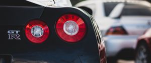 Превью обои nissan gt-r, nissan, автомобиль, спорткар, черный, вид сзади