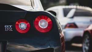 Превью обои nissan gt-r, nissan, автомобиль, спорткар, черный, вид сзади