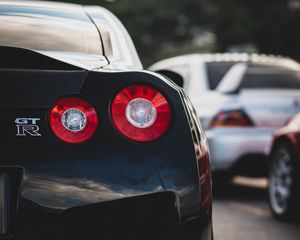 Превью обои nissan gt-r, nissan, автомобиль, спорткар, черный, вид сзади
