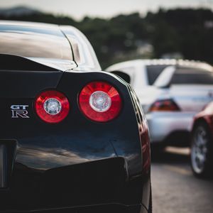 Превью обои nissan gt-r, nissan, автомобиль, спорткар, черный, вид сзади