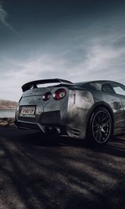 Превью обои nissan gt-r, nissan, автомобиль, серебряный, дорога, вид сбоку