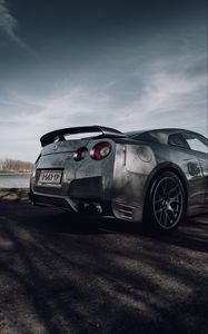 Превью обои nissan gt-r, nissan, автомобиль, серебряный, дорога, вид сбоку