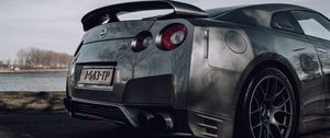 Превью обои nissan gt-r, nissan, автомобиль, серебряный, дорога, вид сбоку