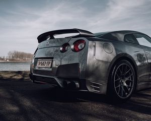 Превью обои nissan gt-r, nissan, автомобиль, серебряный, дорога, вид сбоку