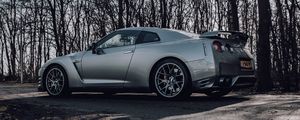 Превью обои nissan gt-r, nissan, автомобиль, серый, деревья, дорога