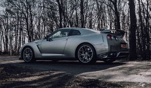 Превью обои nissan gt-r, nissan, автомобиль, серый, деревья, дорога