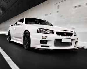 Превью обои nissan gt-r, nissan, движение, белый, вид сбоку