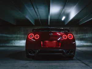 Превью обои nissan gtr, nissan, фары, вид сзади, темный