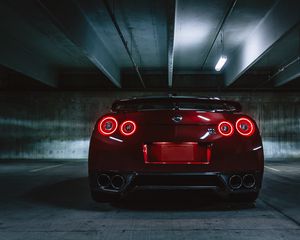 Превью обои nissan gtr, nissan, фары, вид сзади, темный