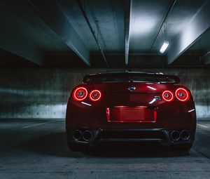 Превью обои nissan gtr, nissan, фары, вид сзади, темный