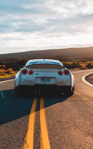 Превью обои nissan gt-r, nissan, машина, спорткар, вид сзади, дорога