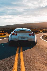 Превью обои nissan gt-r, nissan, машина, спорткар, вид сзади, дорога