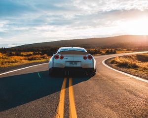 Превью обои nissan gt-r, nissan, машина, спорткар, вид сзади, дорога