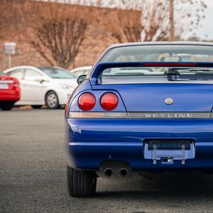 Превью обои nissan skyline r33, nissan, автомобиль, синий, фонари