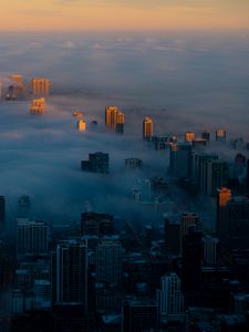 Превью обои ночной город, облака, вид сверху, туман, небоскребы