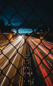 Превью обои ночной город, забор, сетка, дорога, длительное воздействие