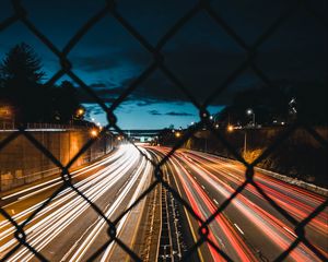 Превью обои ночной город, забор, сетка, дорога, длительное воздействие