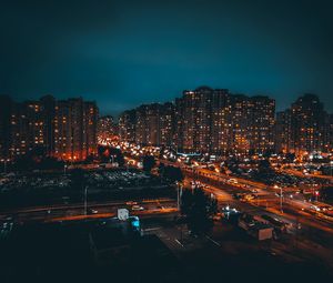 Превью обои ночной город, здания, огни, дорога, темный