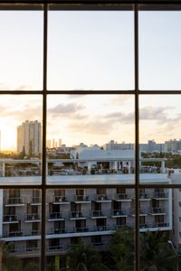 Превью обои окно, город, здания, вид