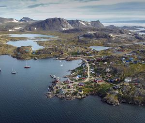 Превью обои остров, побережье, здания, море, пристань