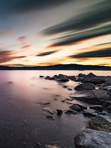 Превью обои озеро, камни, скалы, вода, закат, пейзаж