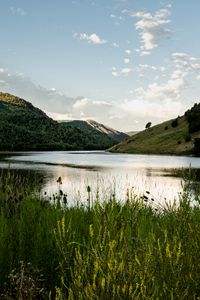 Превью обои озеро, трава, холм, вода, небо