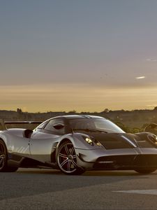 Превью обои pagani, huayra, вид сбоку, дорога