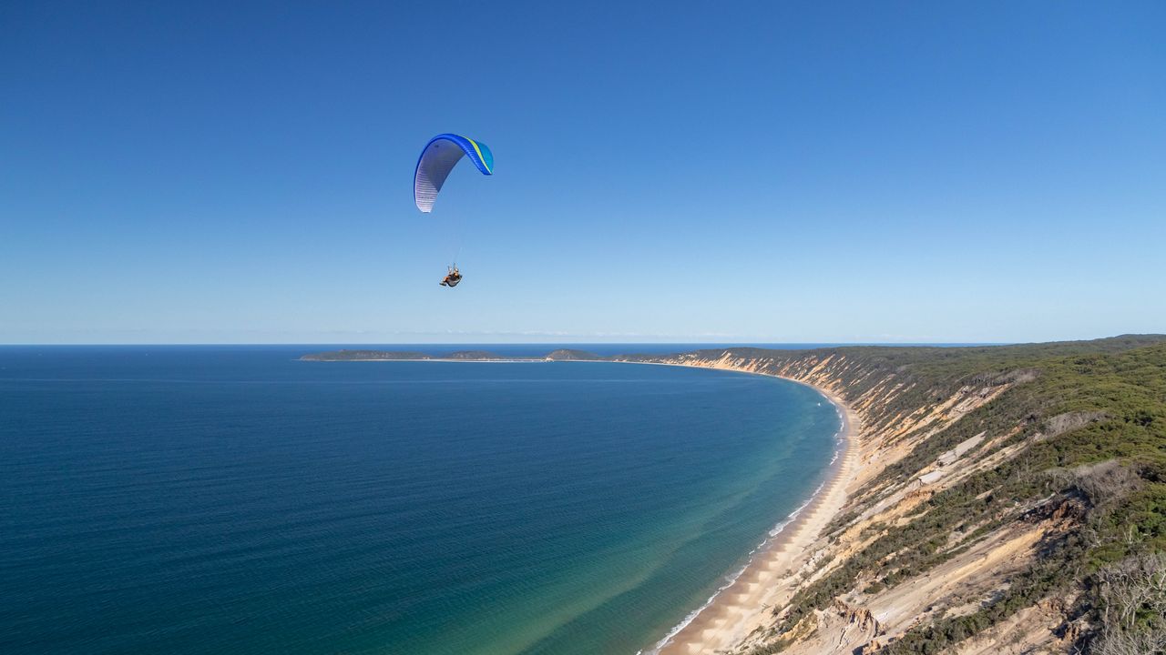 Обои парашют, парашютист, прыжок, море, экстрим