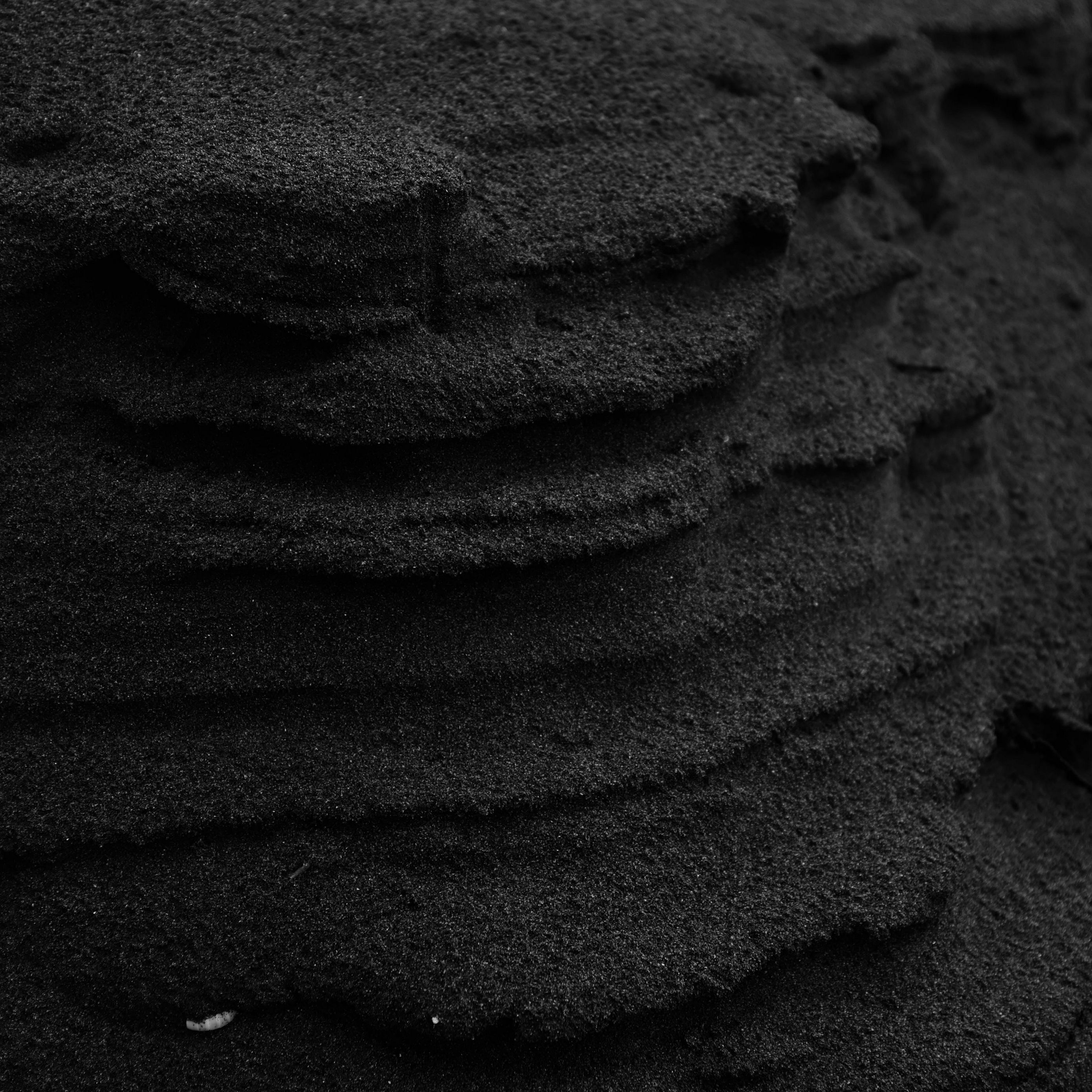 Черный песок текстура