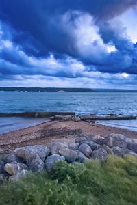 Превью обои пирс, море, облака, небо, камни
