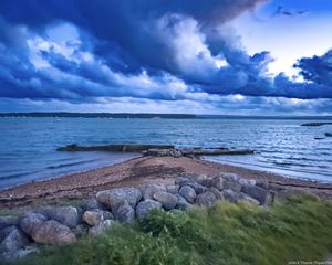 Превью обои пирс, море, облака, небо, камни