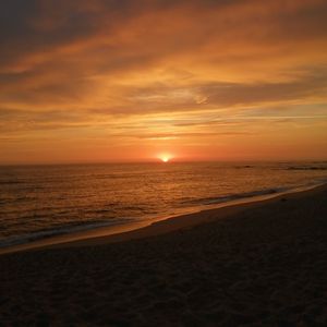 Превью обои пляж, песок, море, закат, темный